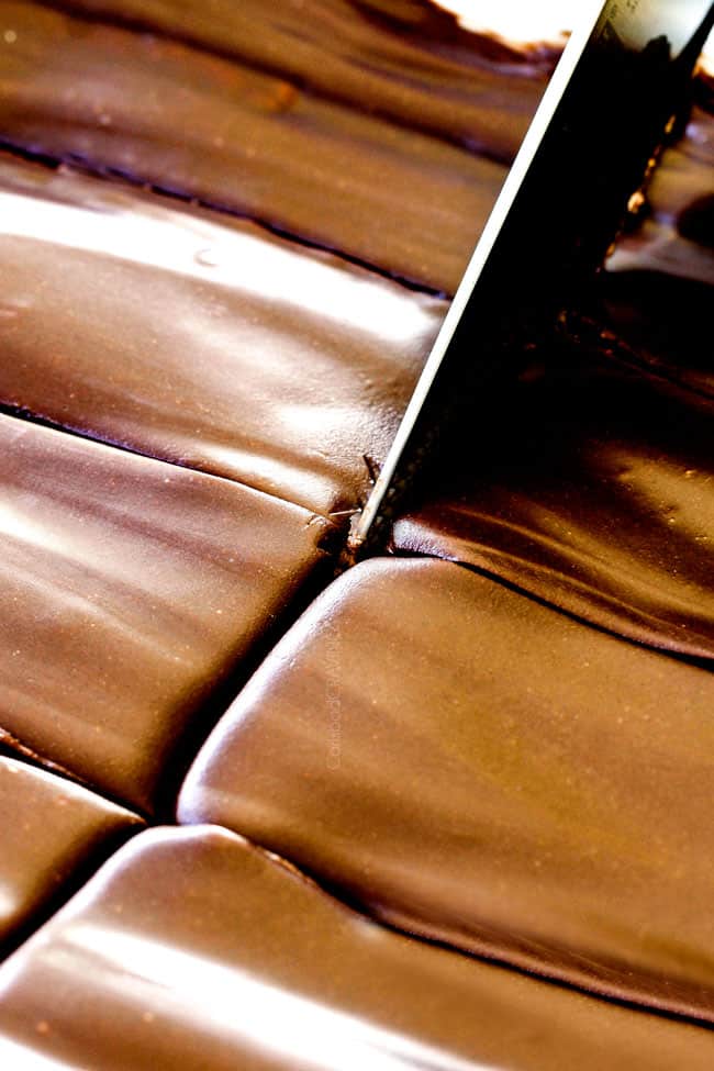 up close of slicing easy Chocolate Eclair Cake