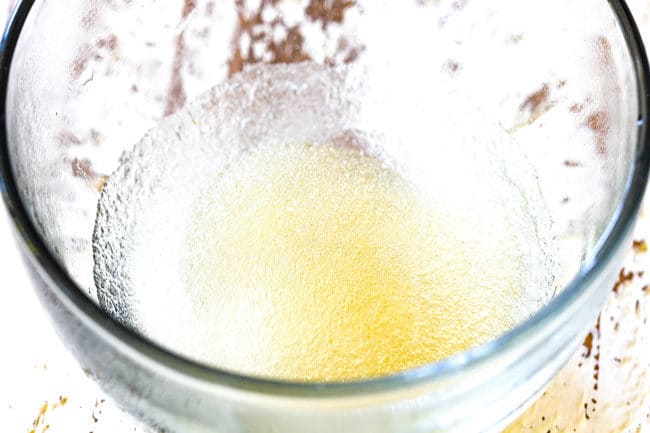 showing how to make Chocolate Eclair Cake by dissolving gelatin in water