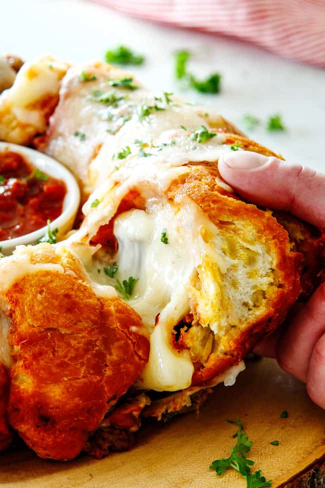 side shot of cheesy pull apart bread being pulled