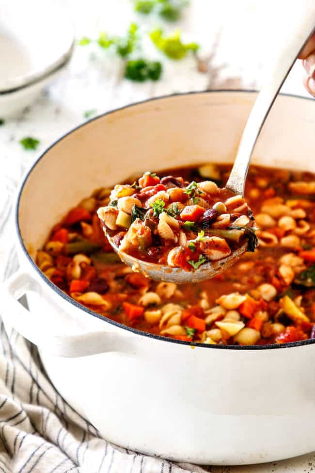 a far away shot of a big scoop of traditional Minestrone Soup Recipe