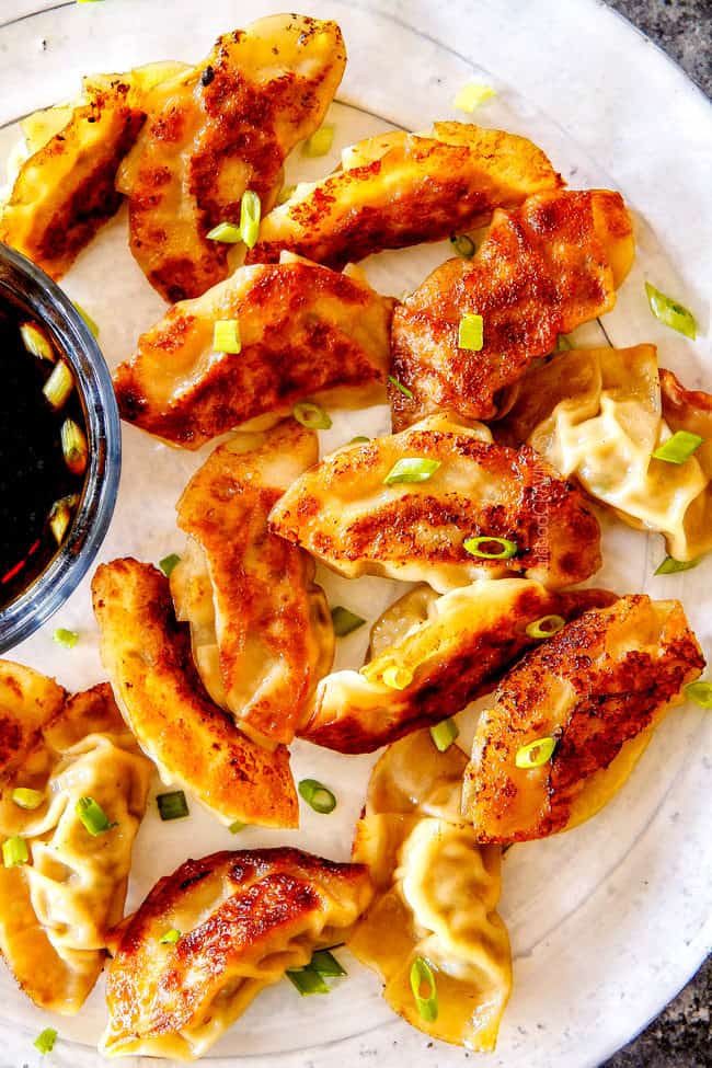 top view of homemade potstickers on a white plate