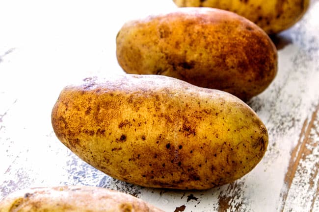showing the best potatoes to make twice baked potatoes with a row of russet potatoes