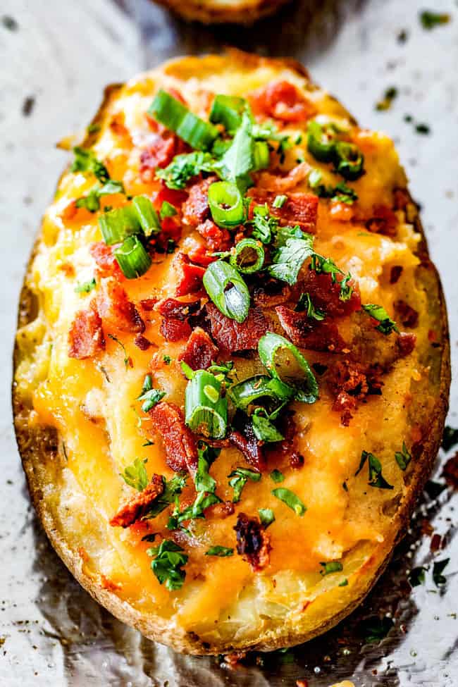 front up close view of make ahead twice baked potatoes with cheese, sour cream and bacon