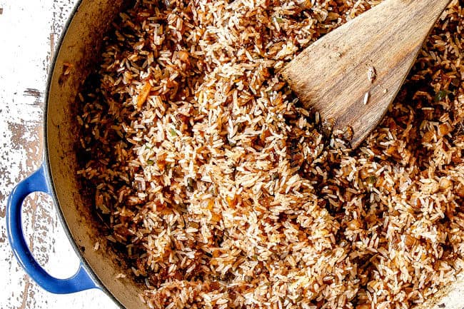 top view of showing how to make Arroz con Pollo by toasting