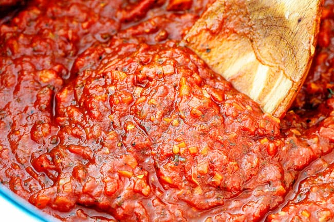 showing how to make marinara sauce by stirring sauce