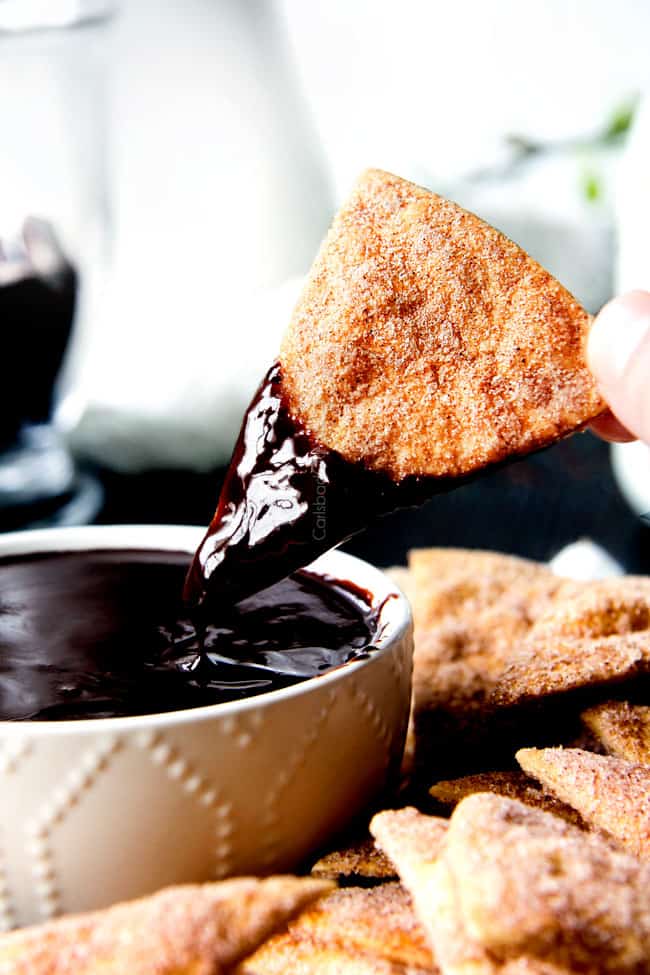 5 Minute Fool Proof Chocolate Ganache (sauce) is silky, creamy, sweet and 1,000 TIMES BETTER than any store bought chocolate sauce. Perfect for brownies, ice cream, cakes, popcorn, strawberries, etc dipping a cinnamon crisp into homemade chocolate ganache