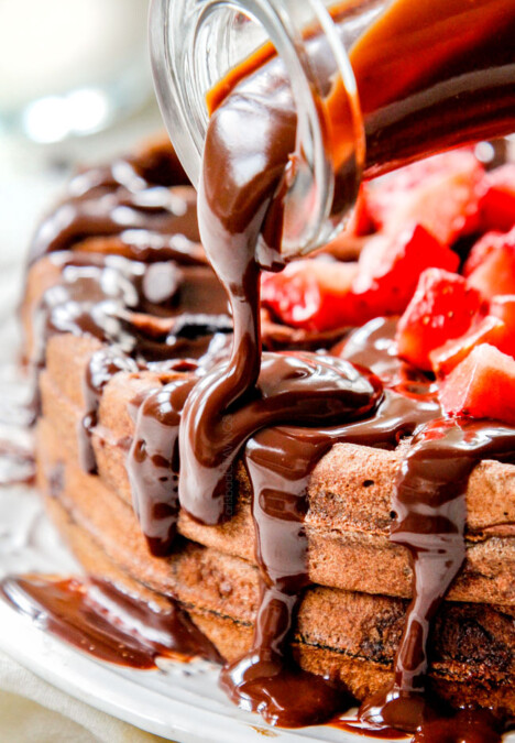pouring chocolate syrup over hershey chocolate waffles