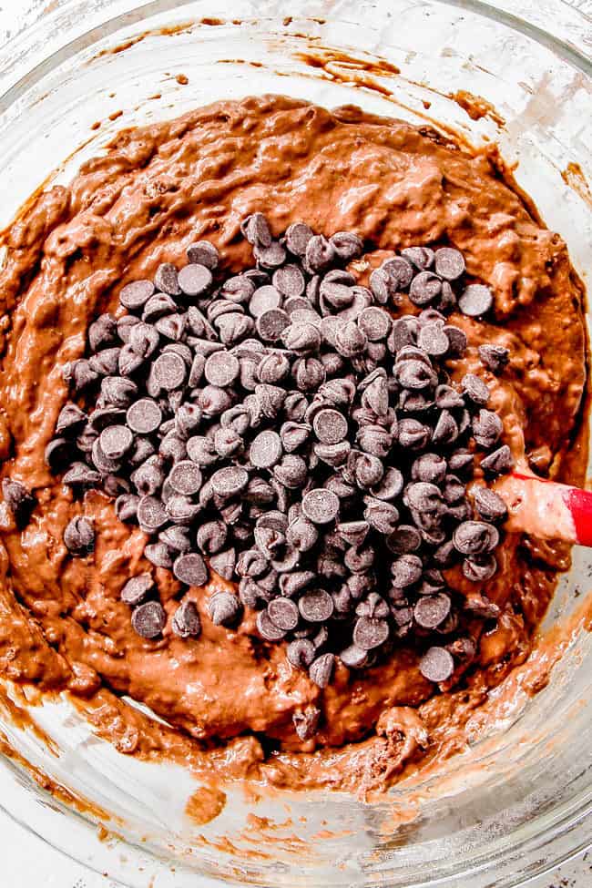 showing how to make Chocolate Waffles by adding chocolate chips into waffle batter