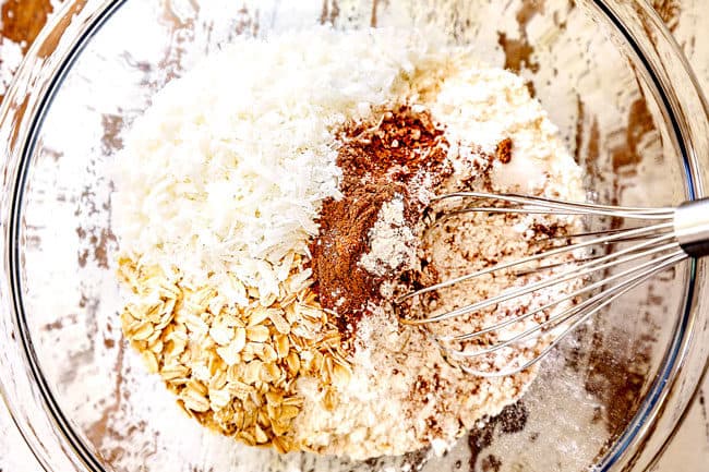 showing how to make Sweet Potato Pancakes by whisking together flour, baking powder, cinnamon, coconut and oatmeal
