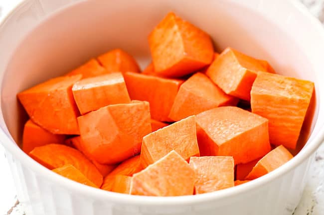showing how to make Sweet Potato Pancakes by cooking sweet potatoes