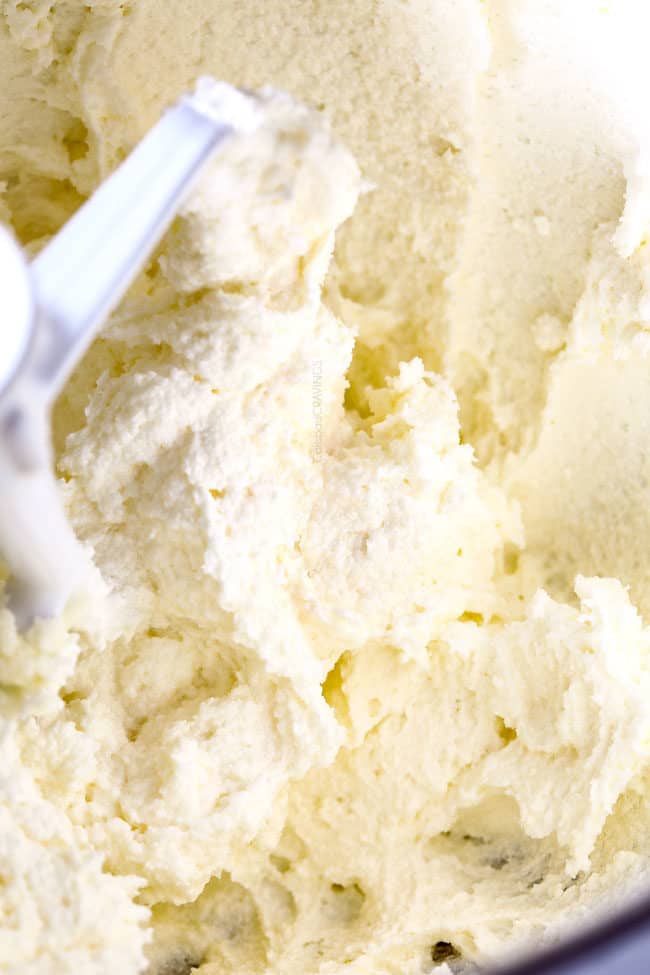 up close showing how to make Kentucky Butter Cake by beating sugar and butter until fluffy