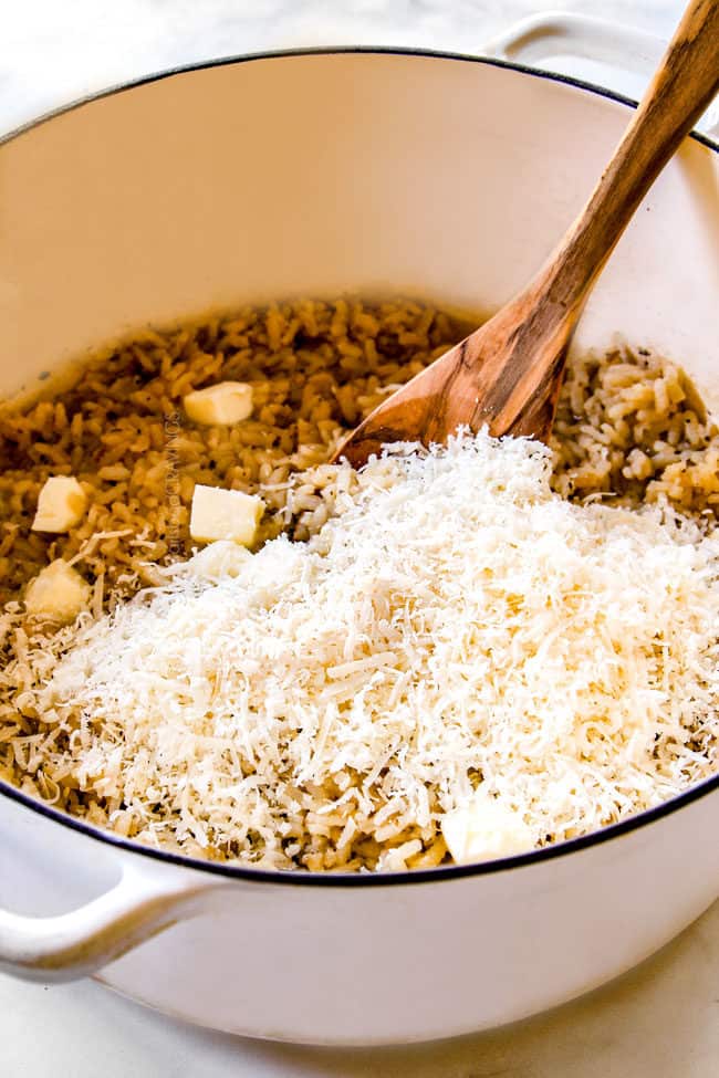 showing how to make risotto by stirring in Parmesan an butter
