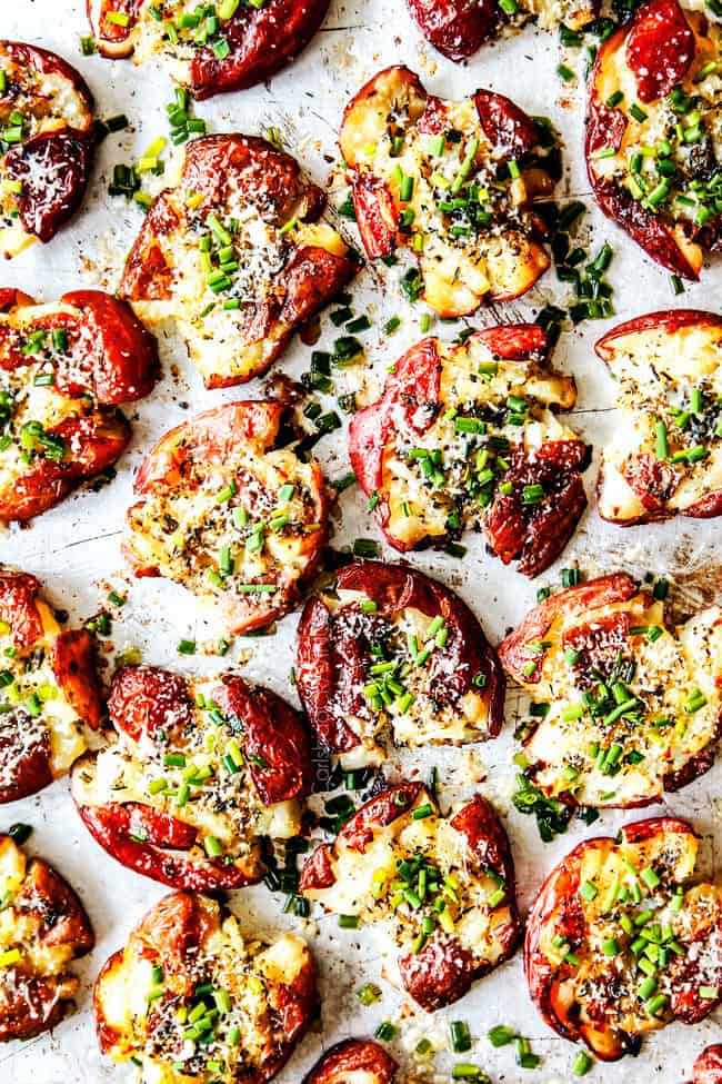 top view of roasted smashed potatoes coming out of the oven