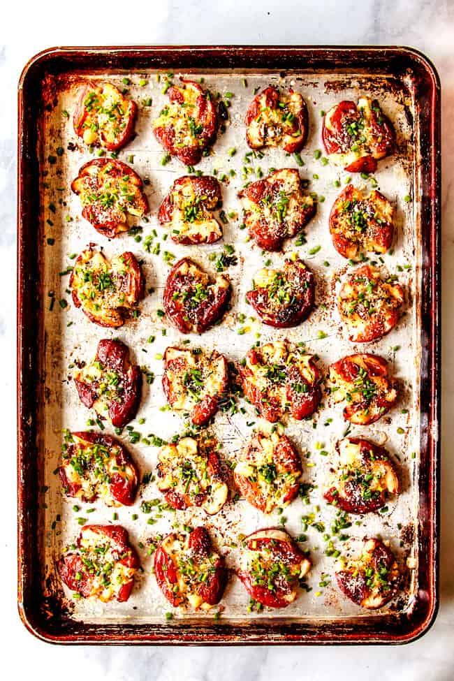 top view of roasted red potatoes with butter, garlic and chives