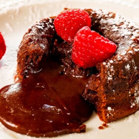 chocolate lava cake recipe on a white plate with an oozing chocolate center
