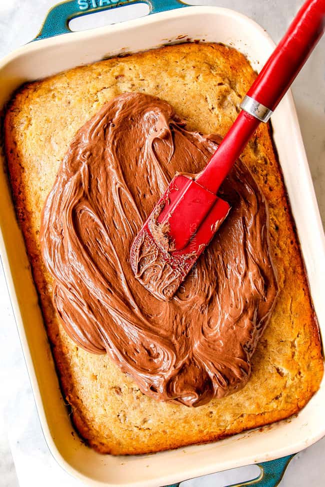 showing how to make banana cake by frosting banana cake