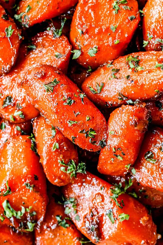 top view of glazed carrots (candied carrots) garnished with parsley