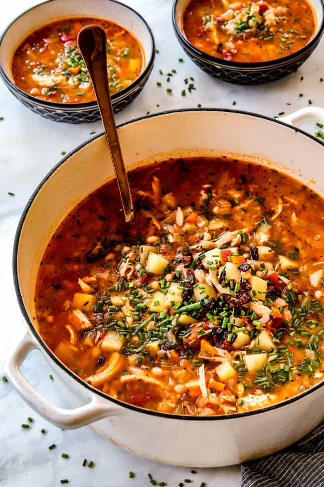 side far away view of a big pot of old fashioned navy bean and ham soup with bacon