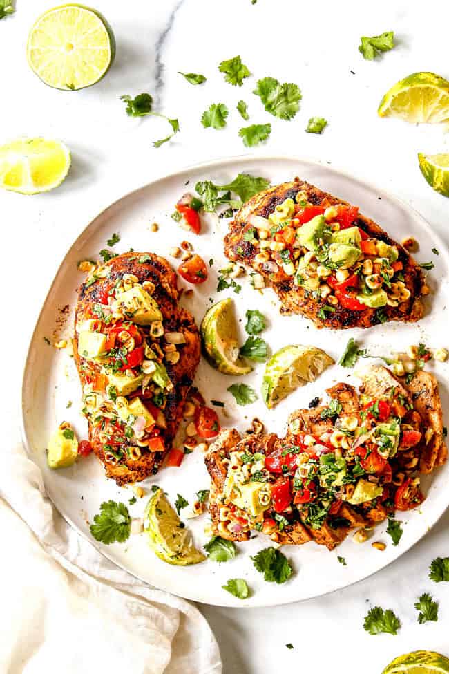 top view of three pieces of fiesta lime chicken on a white plate