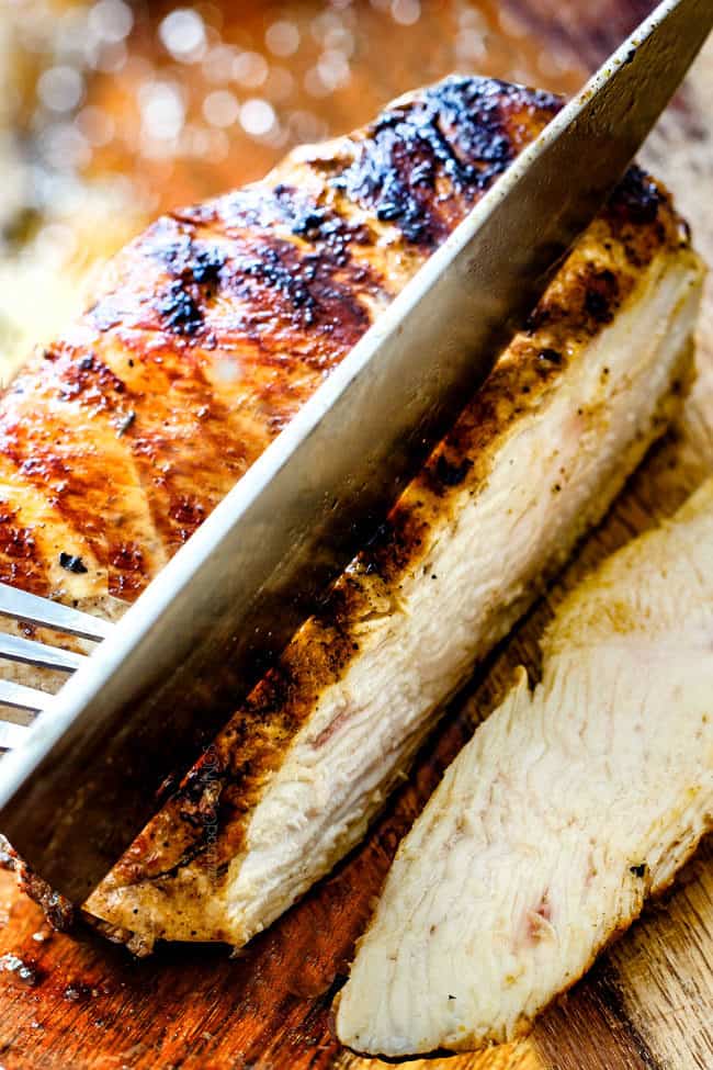 showing how to make chicken gyro recipe by thinly slicing chicken