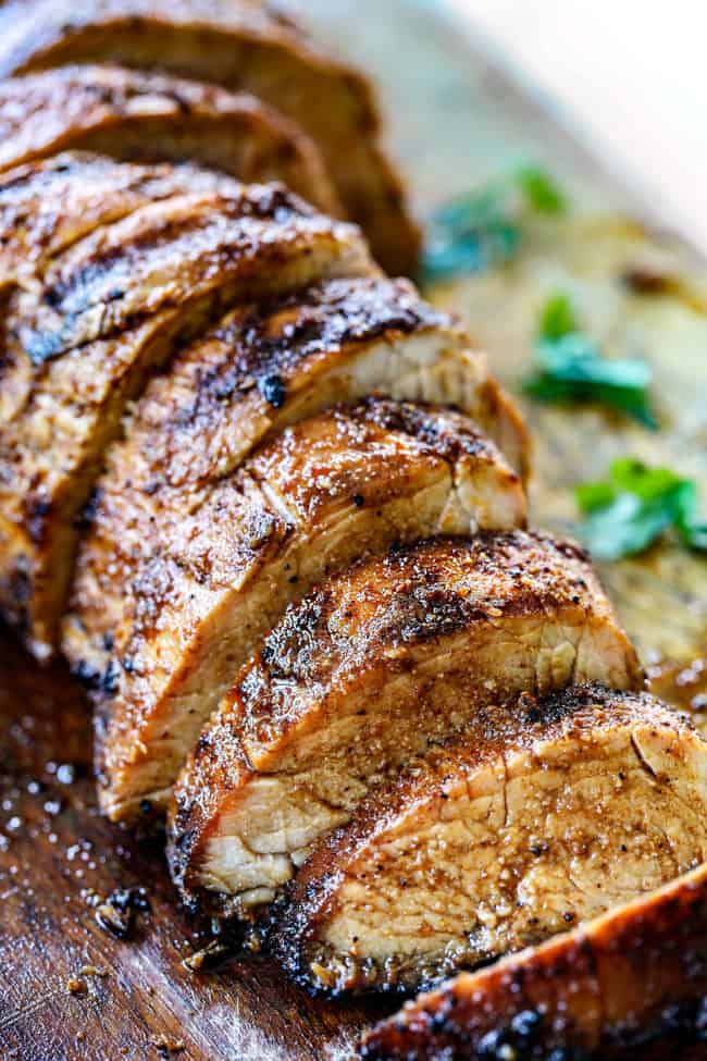 side view of grilled pork tenderloin with a rub