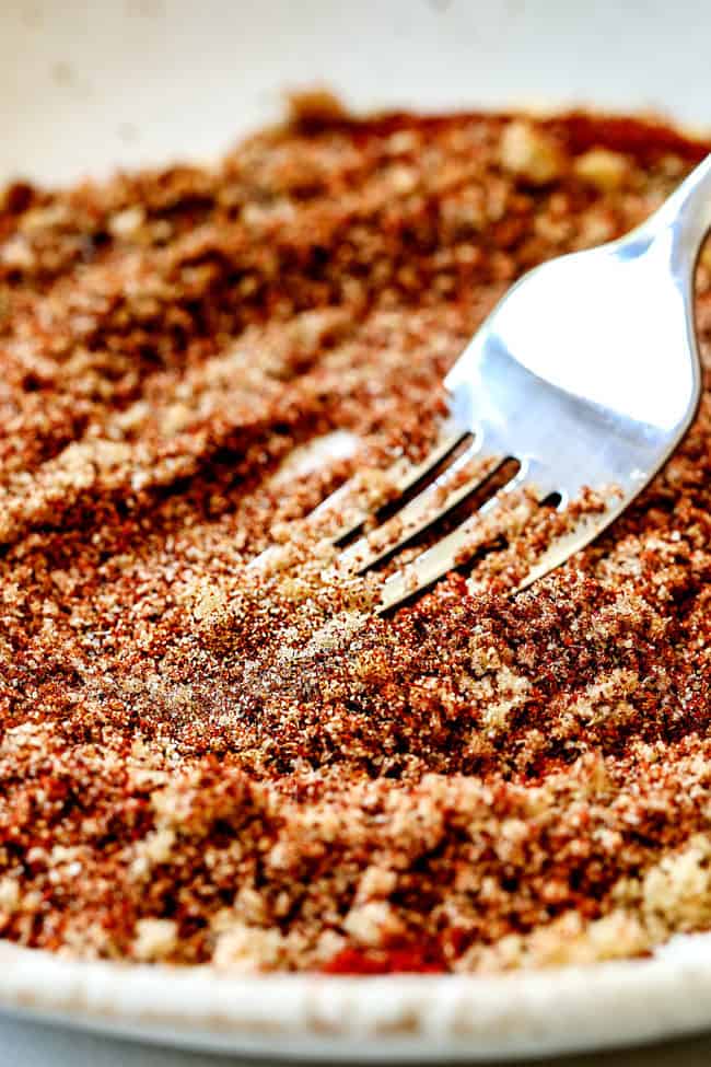 whisking together grilled pork tenderloin rub