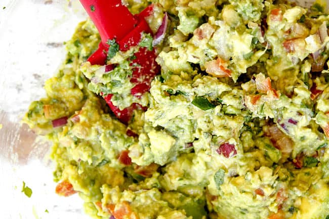 showing how to make carne asada tacos by chopping steak into small pieces by making guacamole