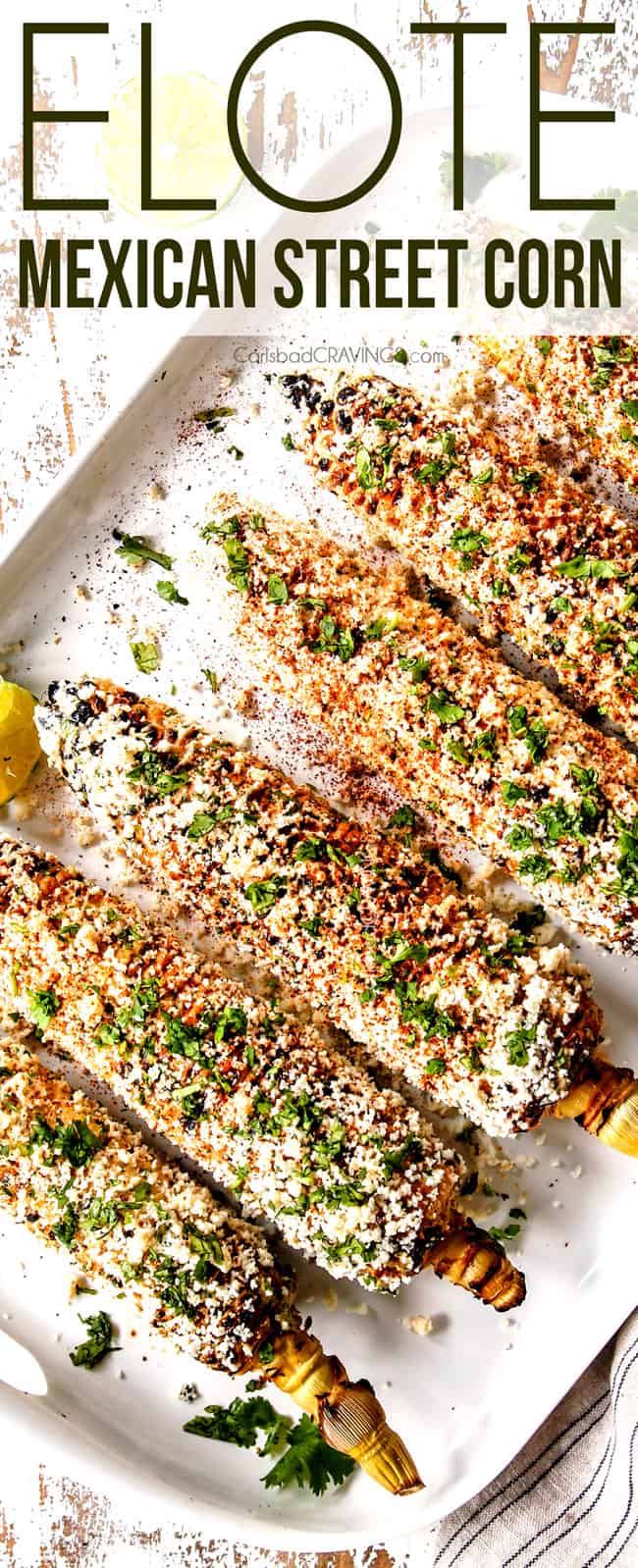 top view of elote recipe on a white platter garnished by cilantro