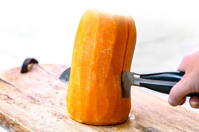 showing how to roast butternut squash by cutting squash in half