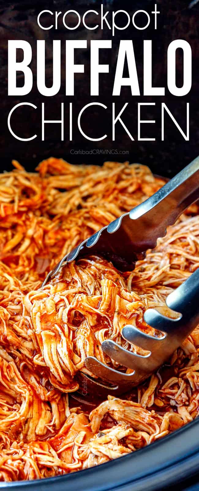 up close of tongs grabbing healthy crockpot buffalo chicken