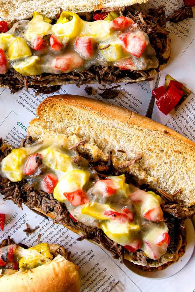 up close of slow cooker Italian Beef Sandwich recipe loaded with toppings