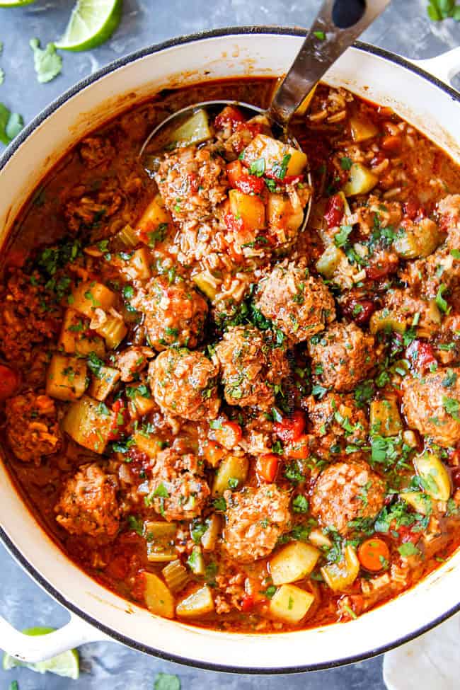 a ladle scooping up Albondigas Soup with cabbage