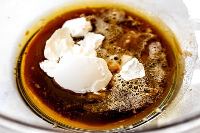 showing how to make best chicken stir fry by adding velvetting ingredients to glass bowl