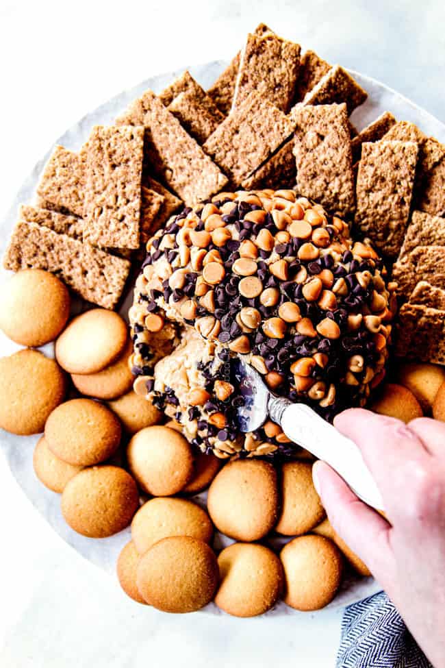 showing how to serve top view of peanut butter balls recipe by scooping out the ball