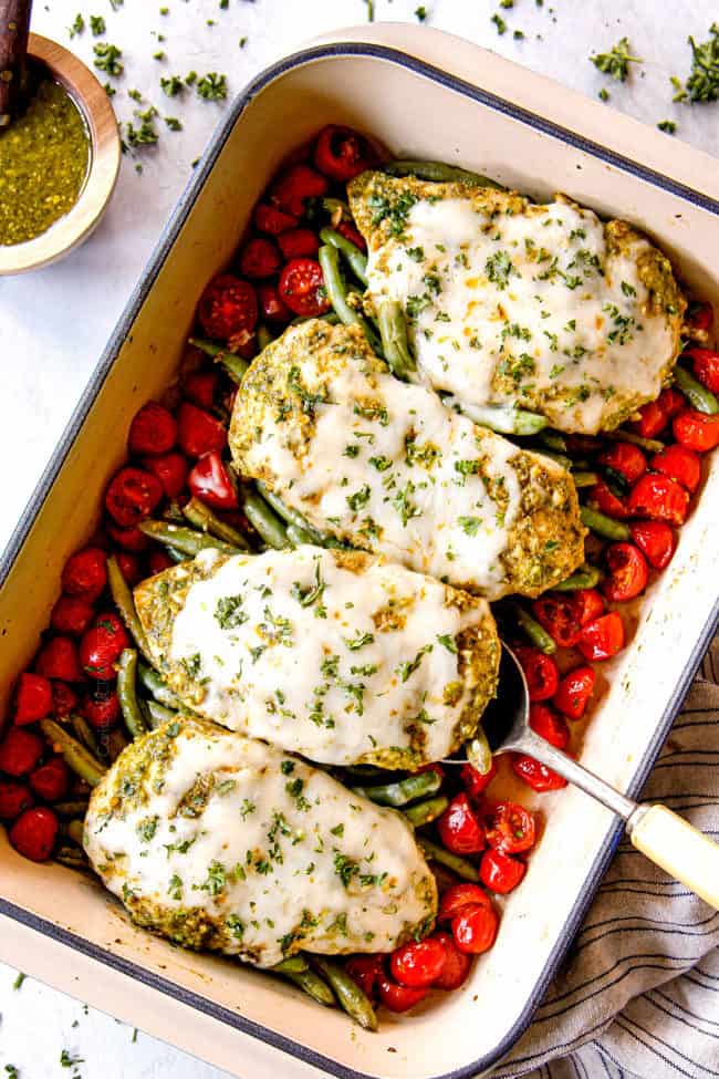 showing how to make pesto chicken bake recipe by letting chicken rest before slicing
