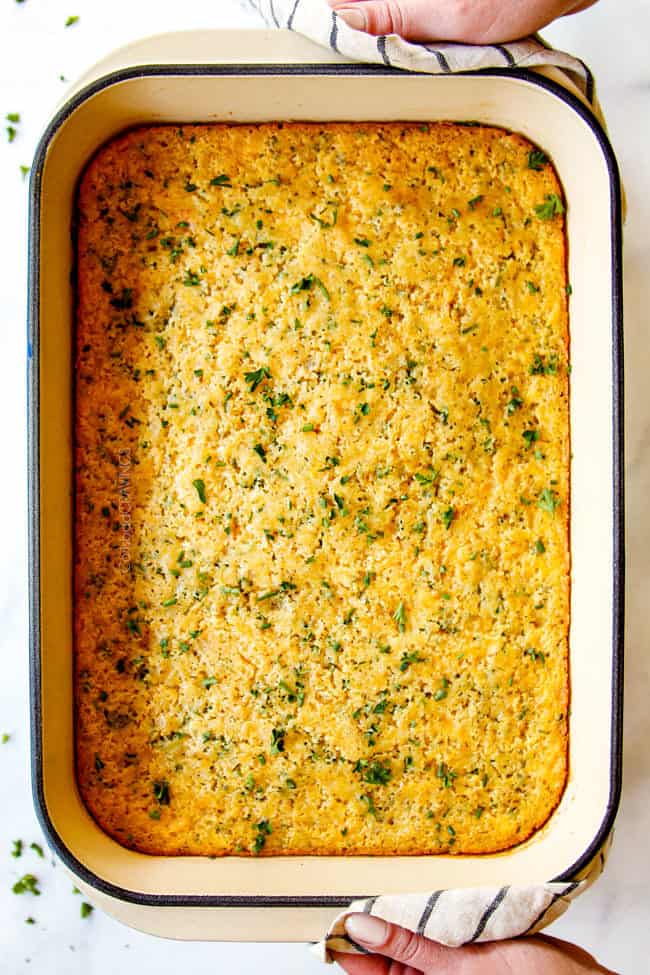 top view of sweet corn casserole recipe in a baking dish