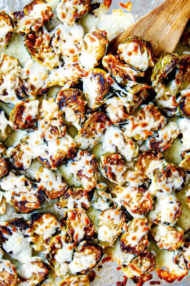 showing how to make Brussels Sprouts recipe in oven with cheese by covering with mozzarella cheese and baking until melted