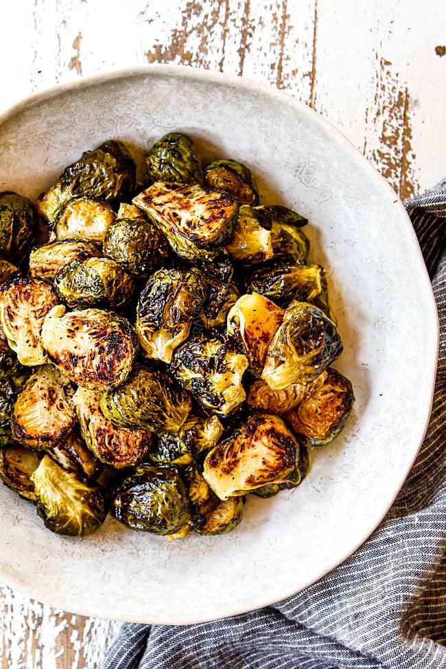 top view of roasted Brussels Sprouts recipe in a white bowl