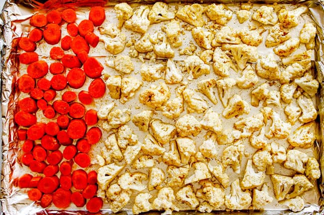 showing how to make cauliflower salad by spreading them on a baking sheet to roast