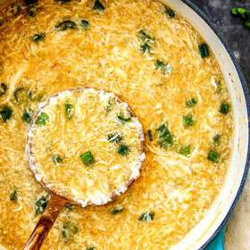 top view of a ladle full easy Egg Drop Soup recipe