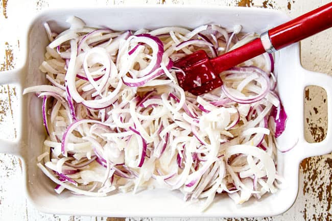 showing how to make easy green bean casserole by adding thinly sliced onions to buttermilk
