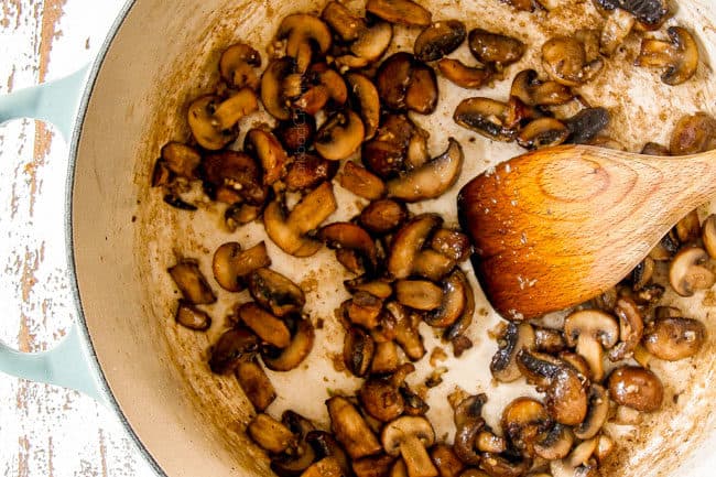 showing how to make fresh green bean casserole from scratch by sauteing mushrooms in butter