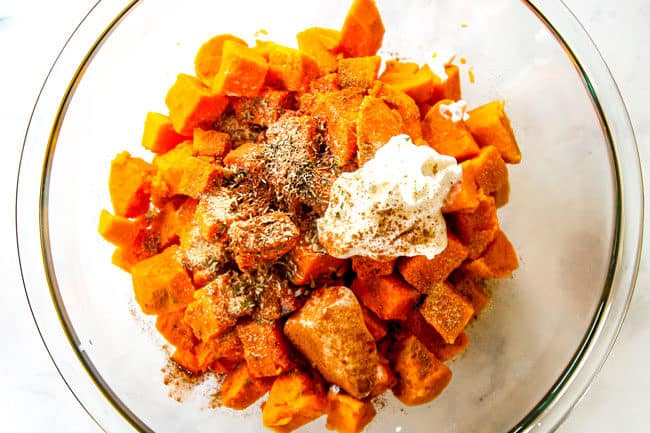 showing how to make mashed sweet potatoes by adding butter, sour cream, milk and maple too sweet potatoes in a glass bowl