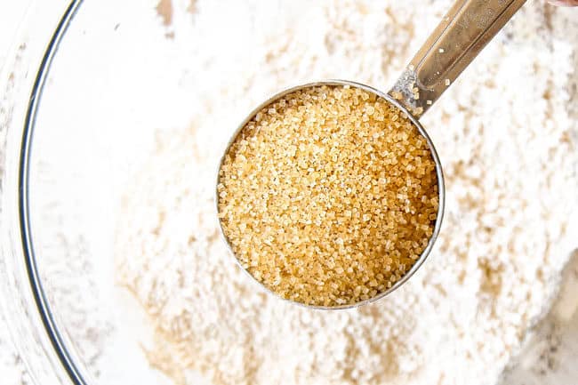 showing how to make Pear Pie by adding sugar topping