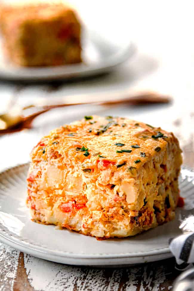 a slice of breakfast casserole recipe on a plate ready to be eaten
