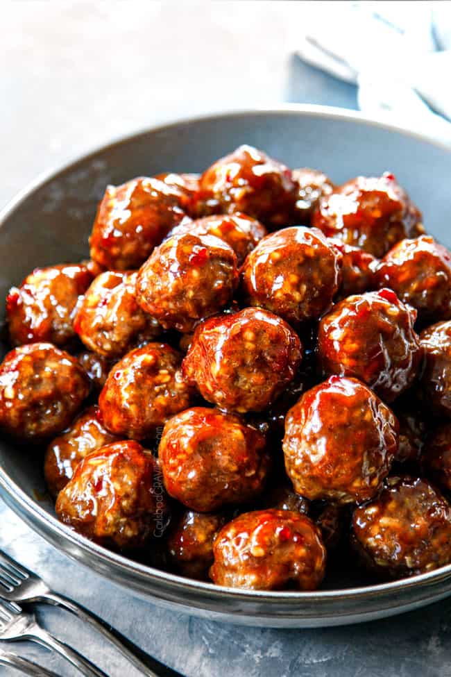 up close of serving cocktail meatballs in a bowl