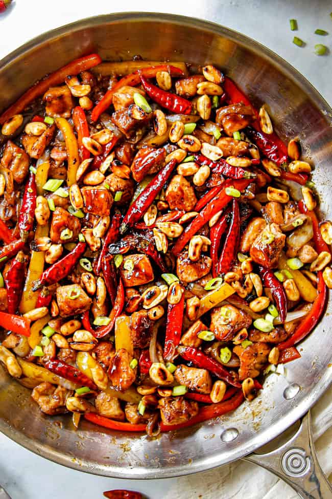 top view of serving Szechuan chicken in a skillet