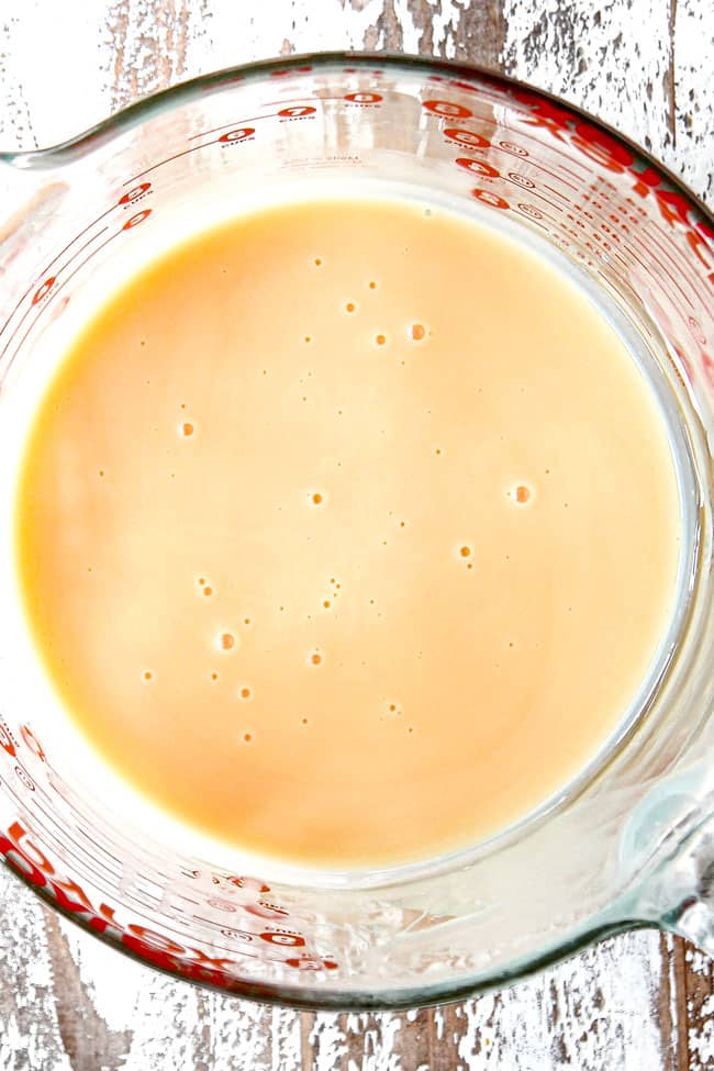 showing how to make tres leches cake by microwaving condensed milk for 15 minutesmicrowaving