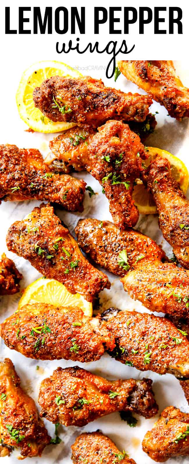 top view of lemon pepper wings serving with lemon pepper wings sauce