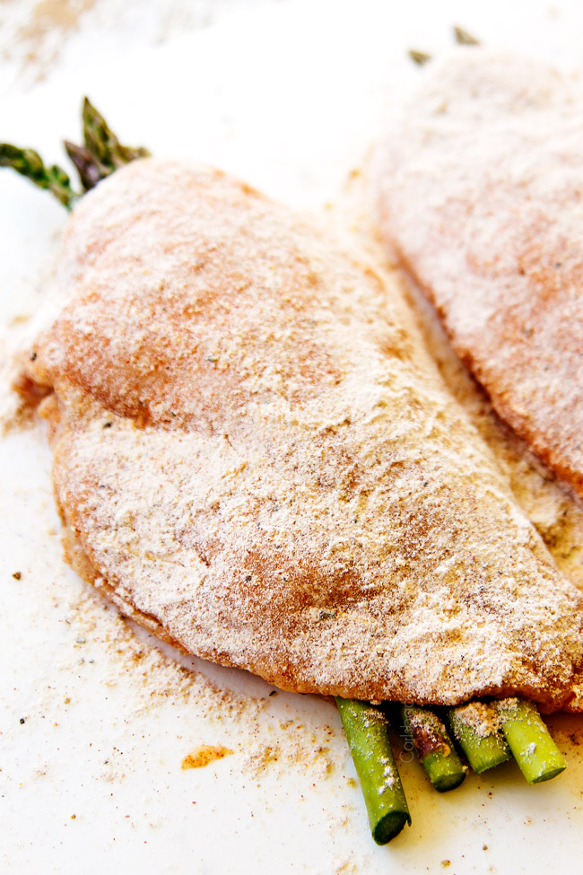 showing how to make chicken piccata recipe by folding chicken over